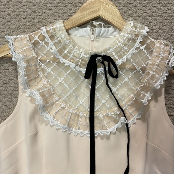 Crème coloured cocktail Dress with upper lace trim. - Picture 2 of 6